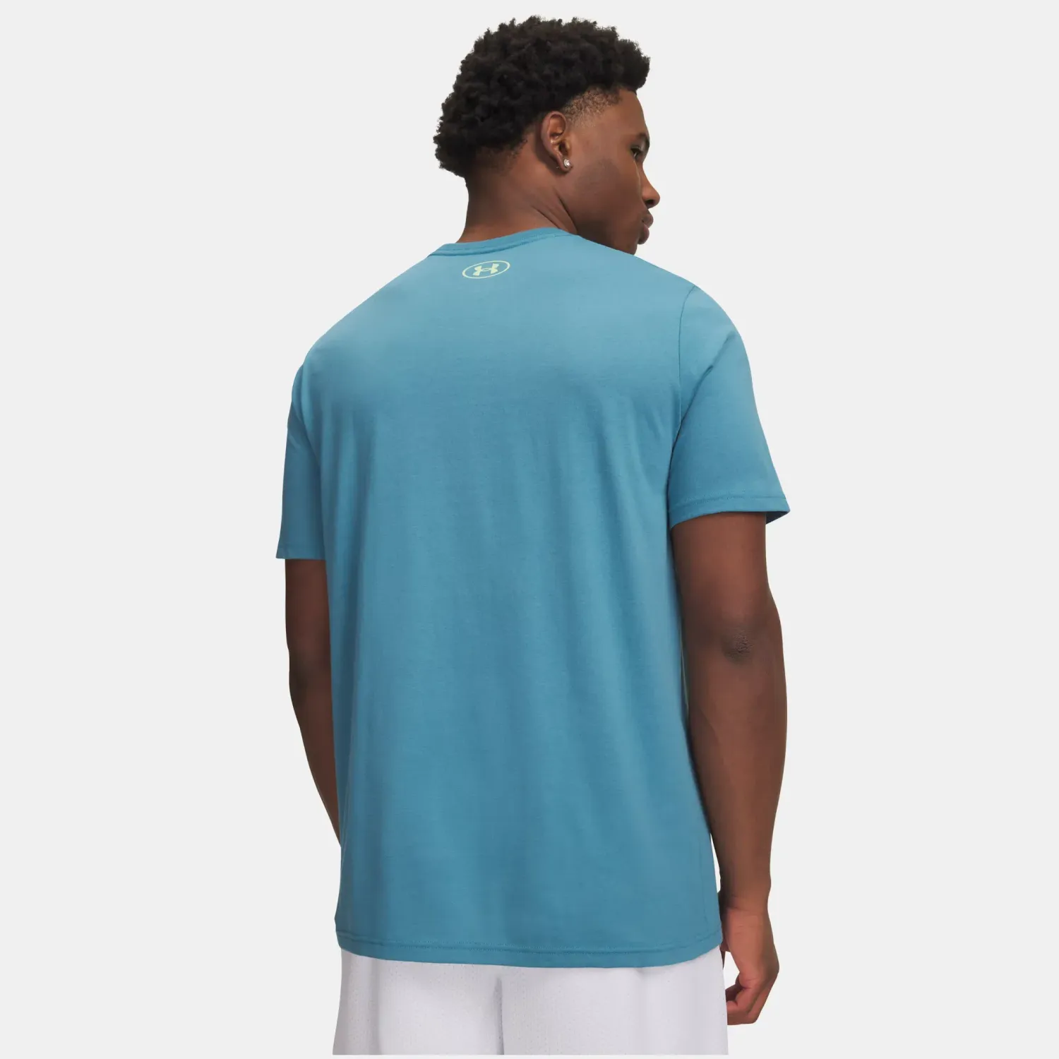 Polo Under Armour Training Hombre Team Issue Wordmark color turquesa | Platanitos