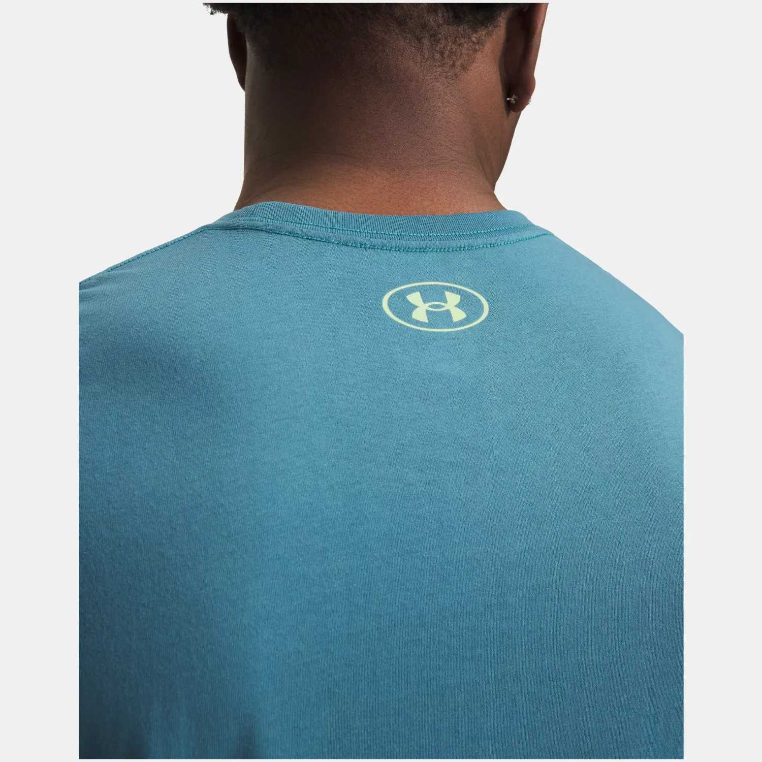 Polo Under Armour Training Hombre Team Issue Wordmark color turquesa | Platanitos