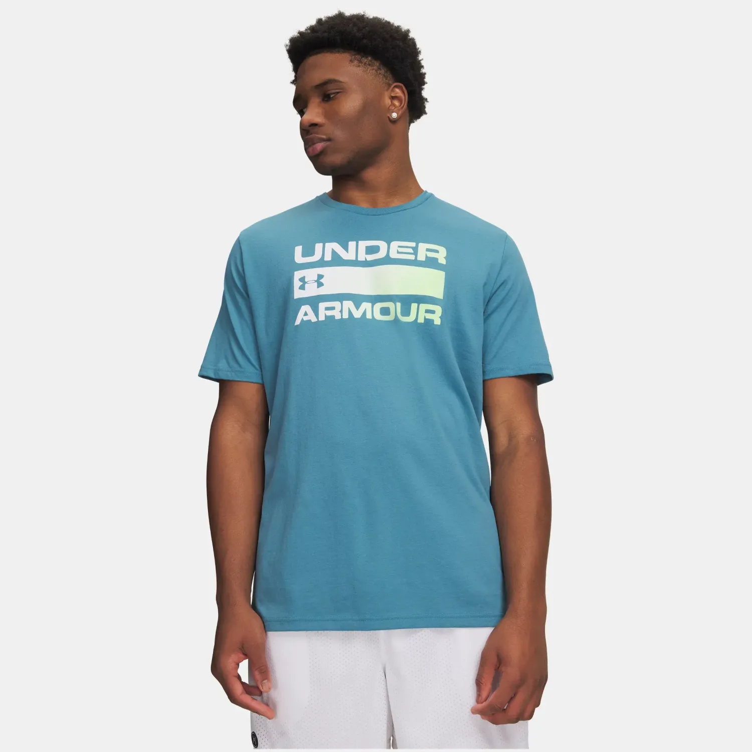 Polo Under Armour Training Hombre Team Issue Wordmark color turquesa | Platanitos