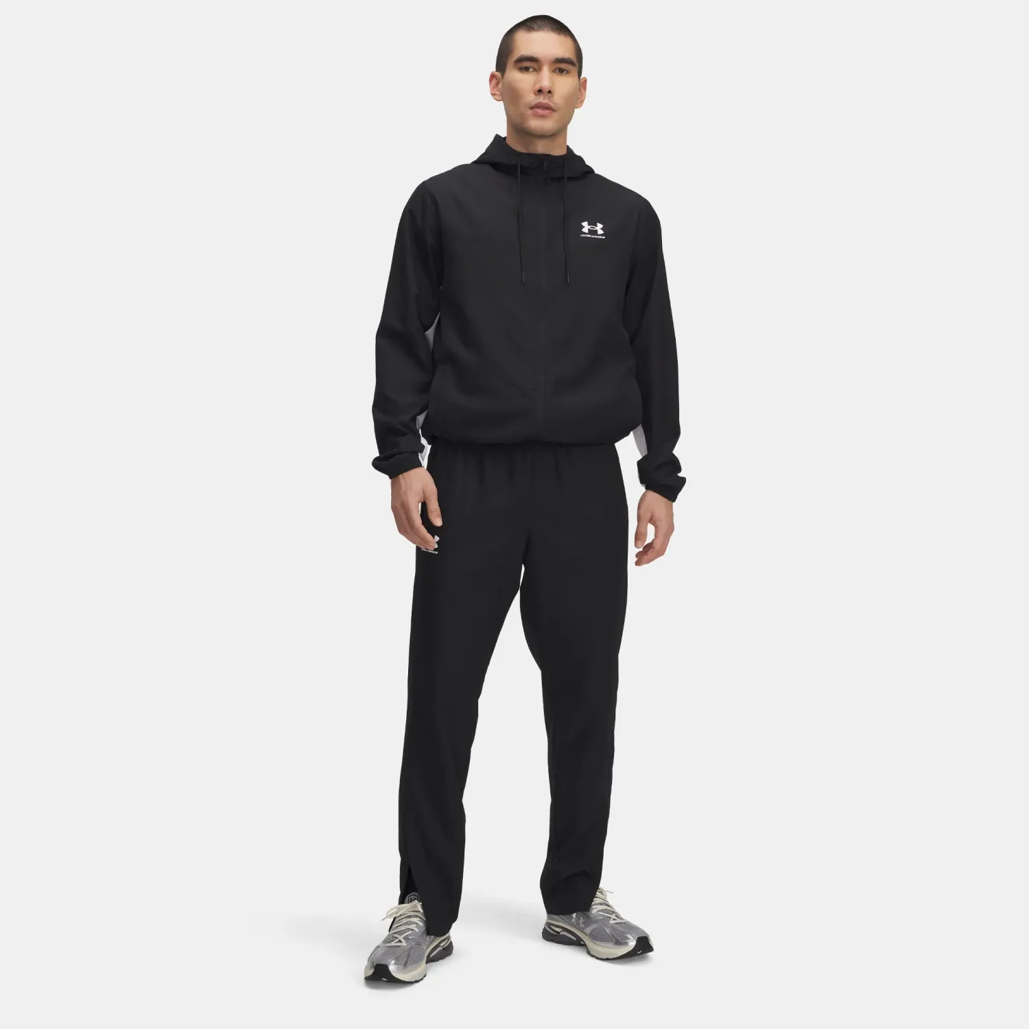 Under Armour Pantalon Under Armour Deportivo Hombre Rival Windbreaker color negro | Platanitos