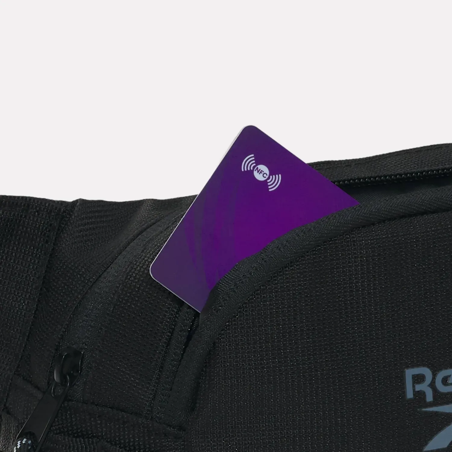 Canguro Reebok Training Unisex Rbk Restore Waistbag color negro | Platanitos