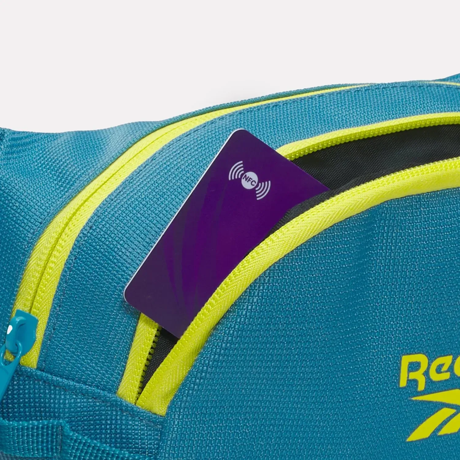Canguro Reebok Training Unisex Rbk Restore Waistbag color azul | Platanitos