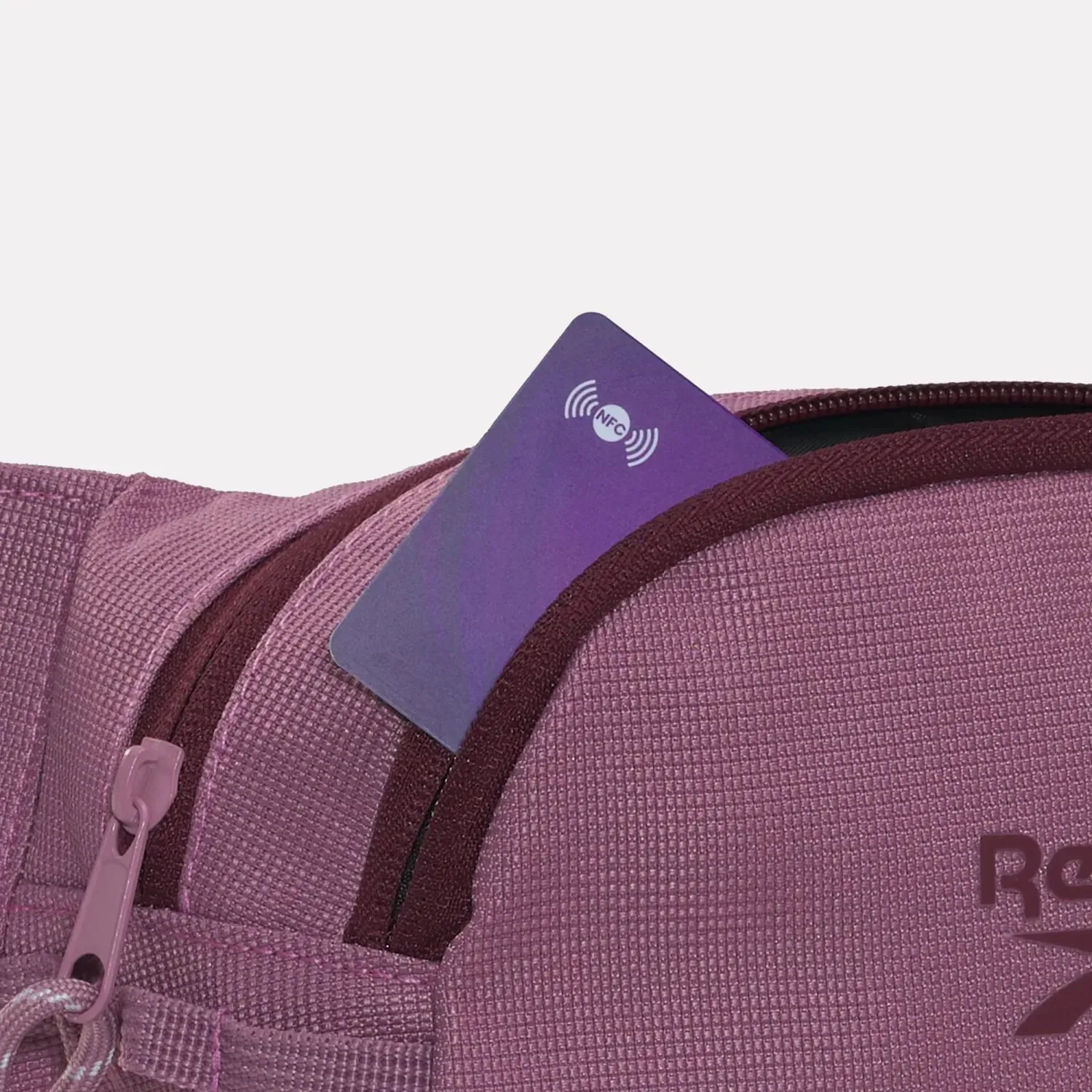 Canguro Reebok Training Unisex Rbk Restore Waistbag color rosa | Platanitos