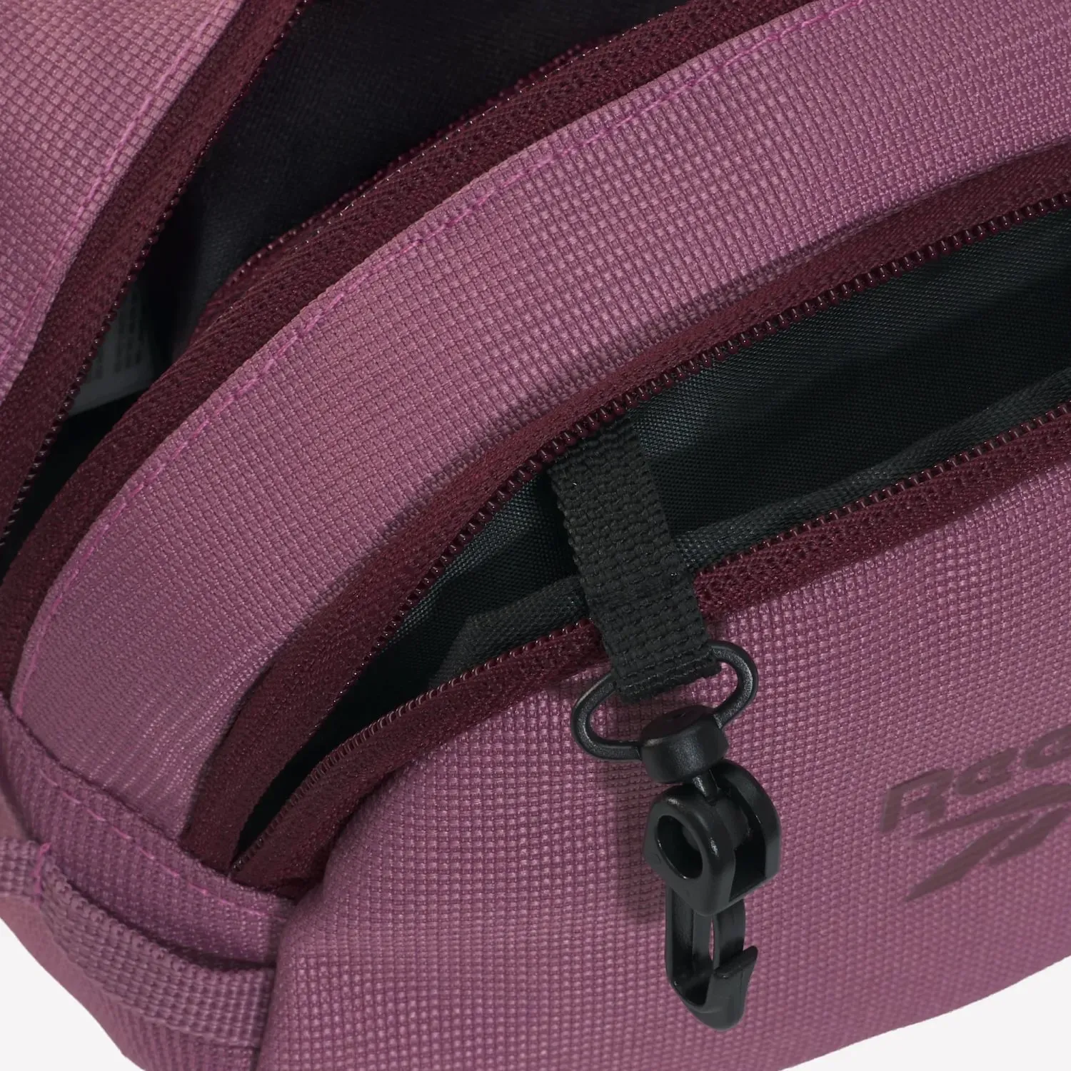 Canguro Reebok Training Unisex Rbk Restore Waistbag color rosa | Platanitos