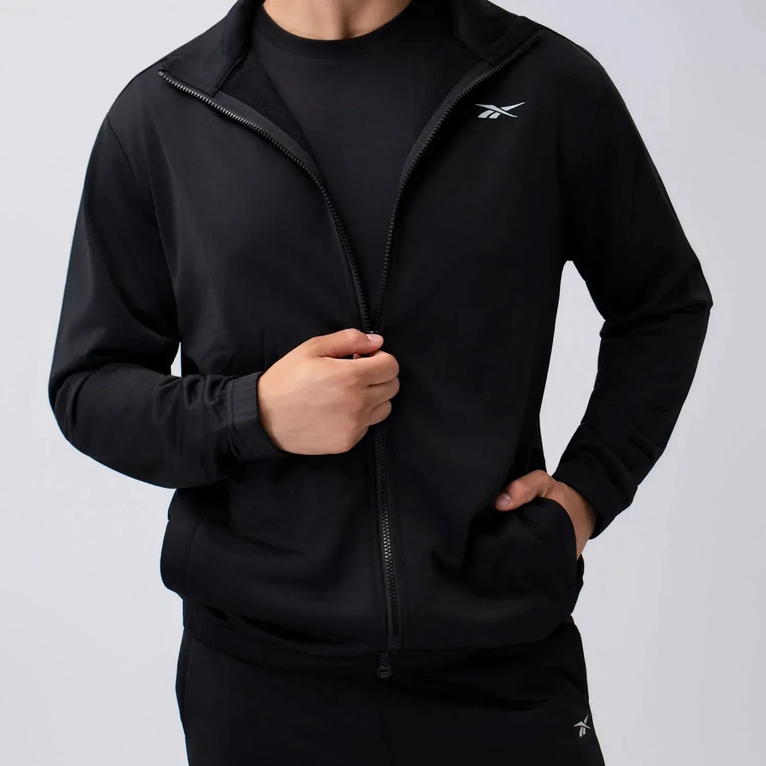 Reebok Conjunto Reebok Deportivo Hombre Core Training Tracksuit color negro | Platanitos