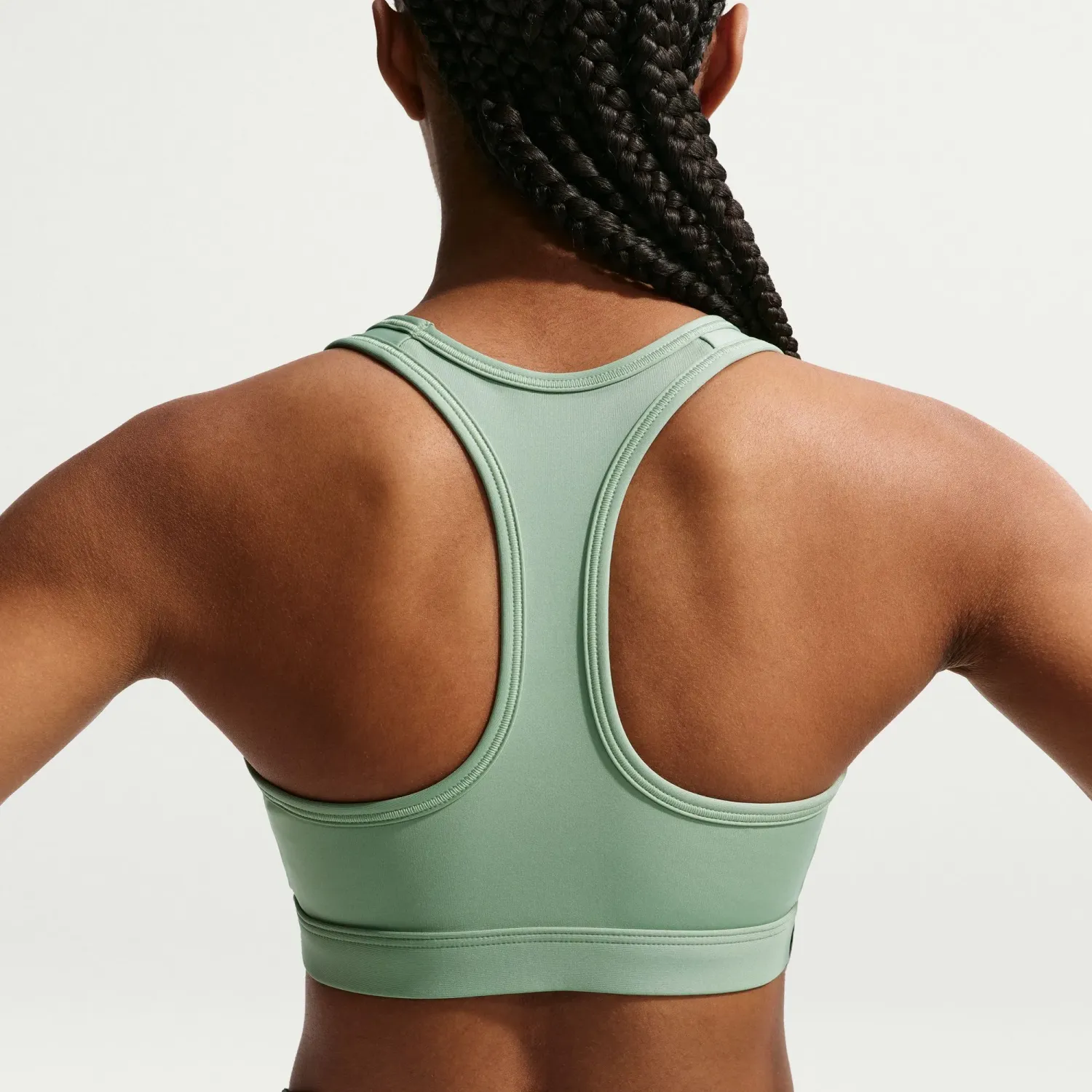 Top Nike Training Mujer Dri-Fit Swoosh - Soporte Medio color blanco | Platanitos
