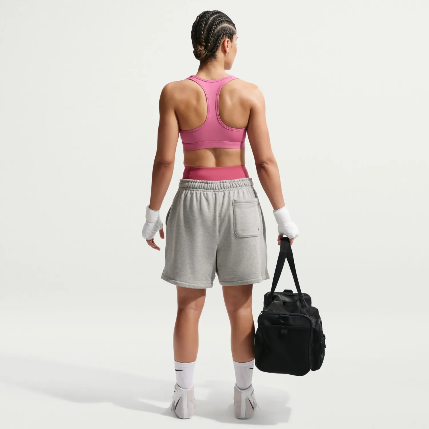 Nike Top Nike Training Mujer Dri-Fit Swoosh - Soporte Medio color rosa | Platanitos