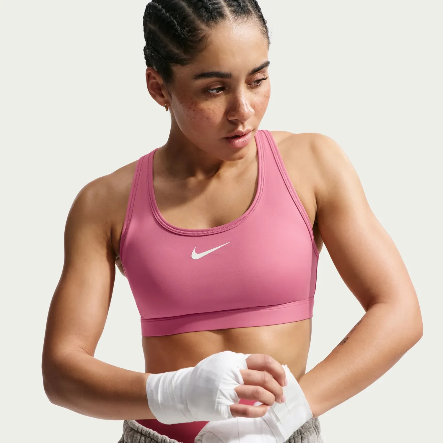 Nike Top Nike Training Mujer Dri-Fit Swoosh - Soporte Medio color rosa | Platanitos
