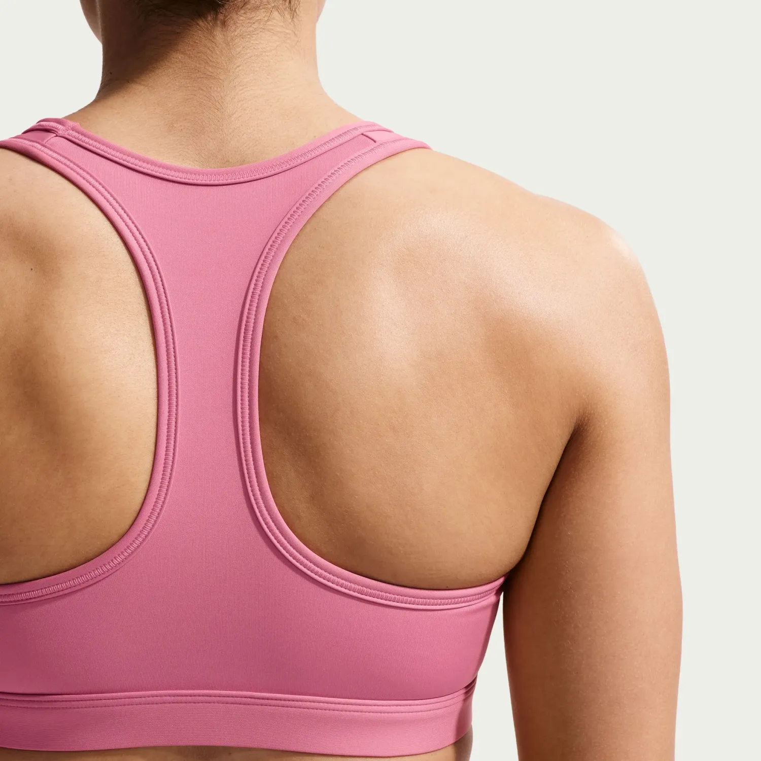 Nike Top Nike Training Mujer Dri-Fit Swoosh - Soporte Medio color rosa | Platanitos