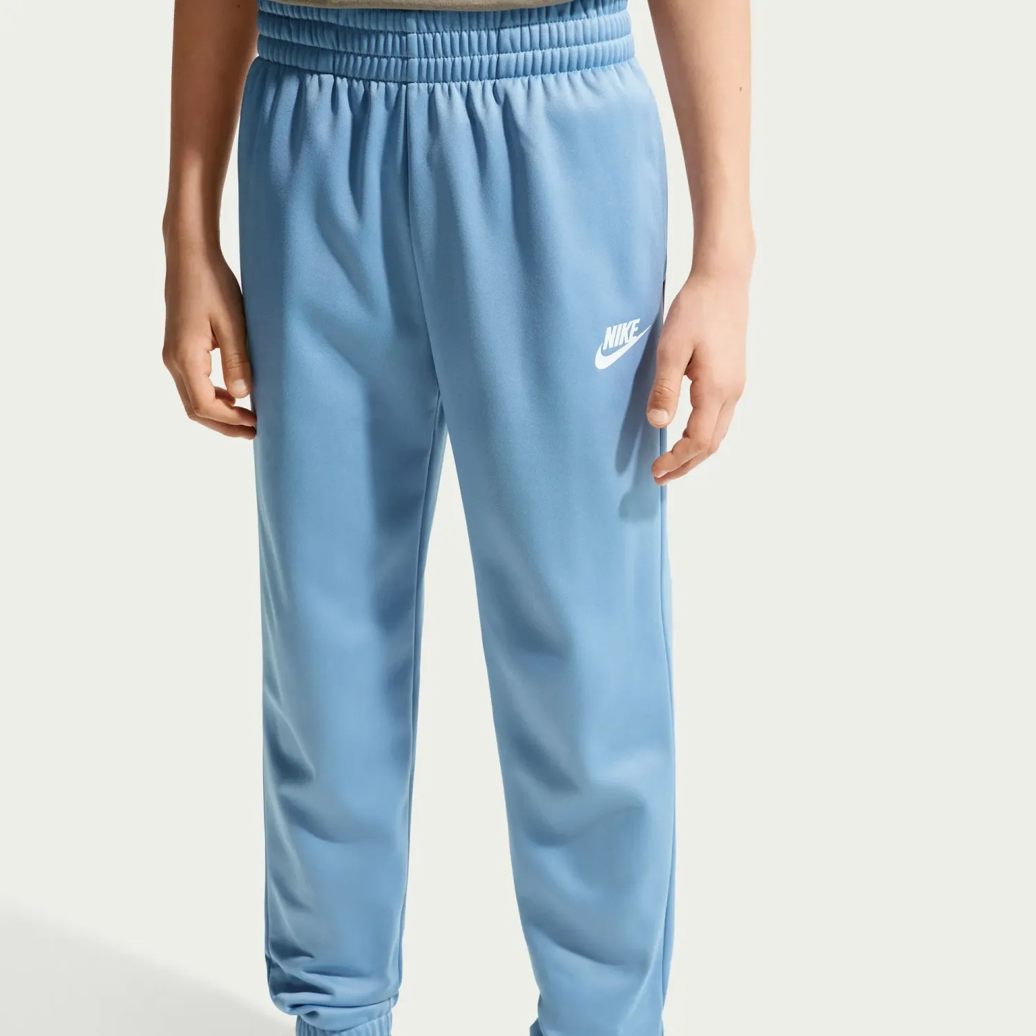 Nike Conjunto Nike Sportswear Juvenil Dri-Fit Tracksuit color celeste | Platanitos