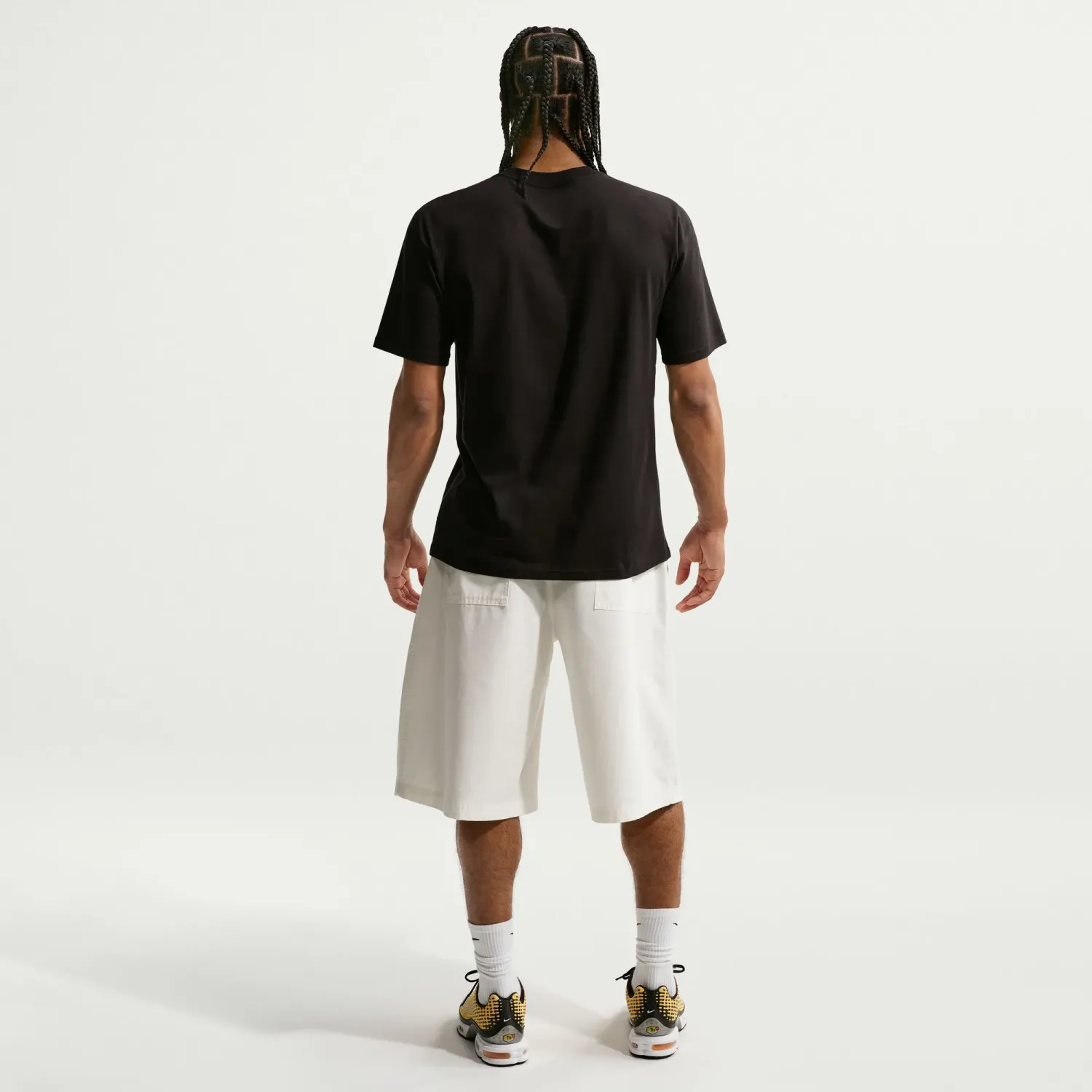 Nike Polo Nike Deportivo Unisex Sportswear Sunburst Swoosh color negro | Platanitos