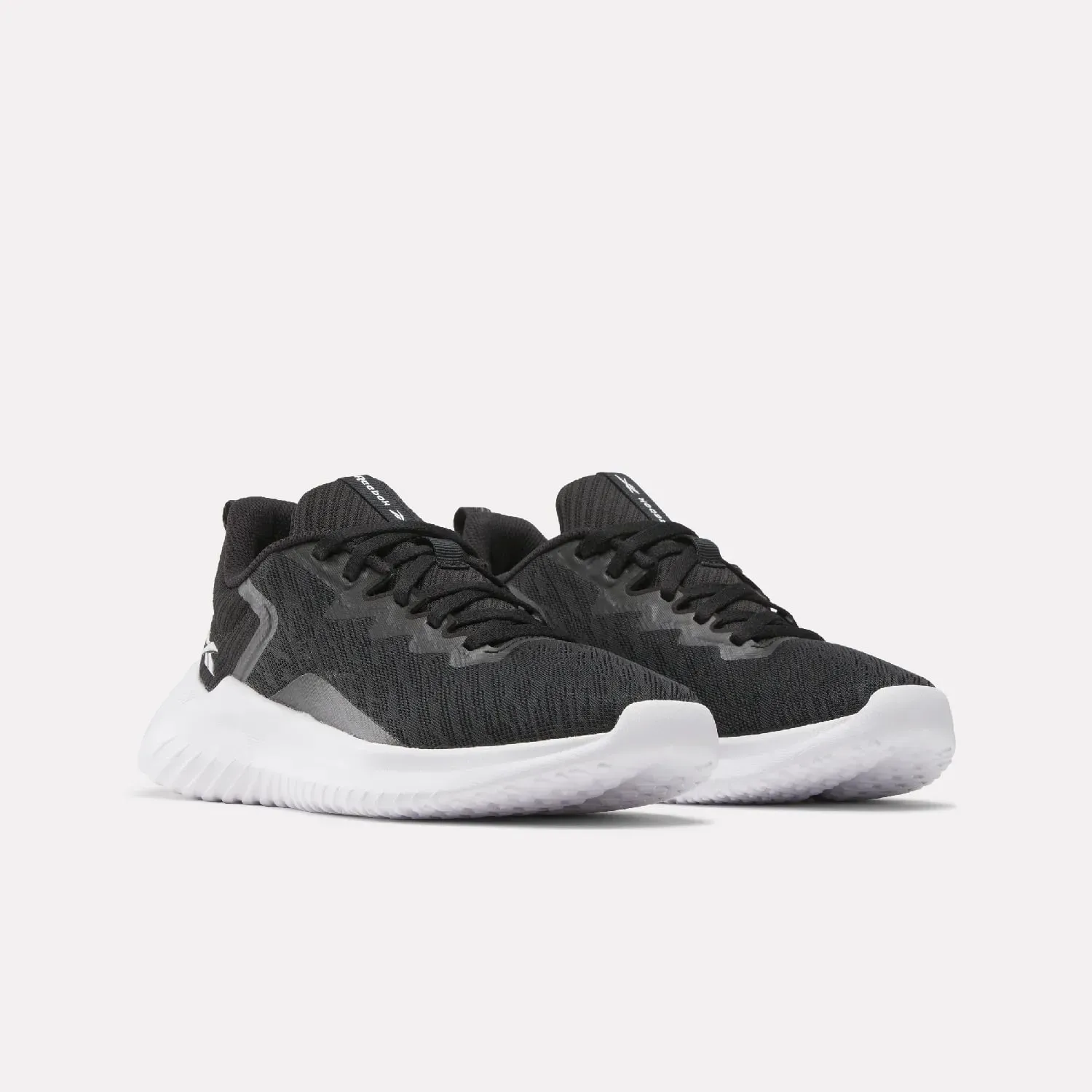 Zapatillas Reebok Training Mujer Fluxlite Li color negro | Platanitos