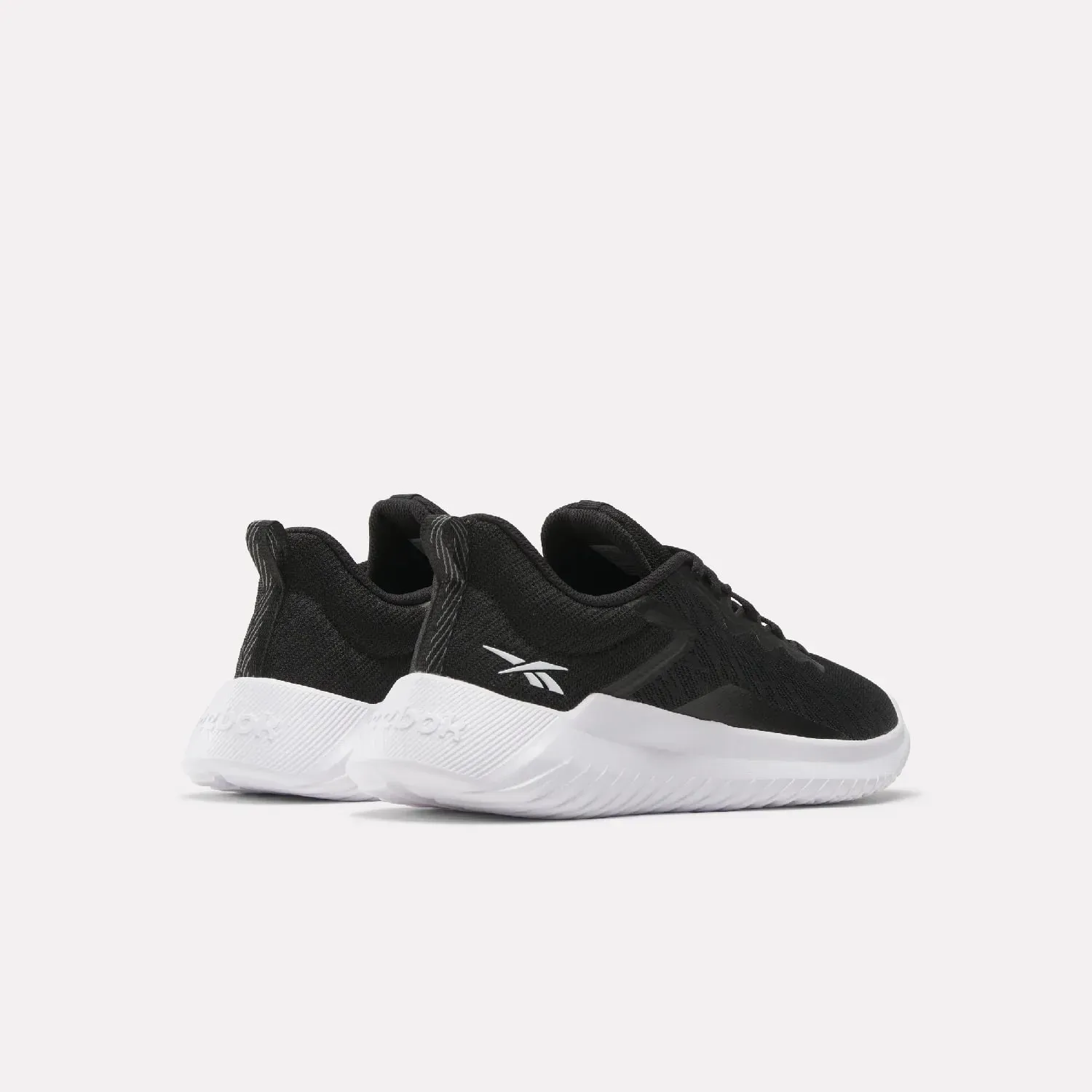 Zapatillas Reebok Training Mujer Fluxlite Li color negro | Platanitos